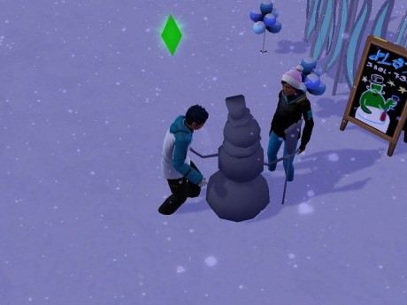 Ashley s Harrym staví sněhuláka